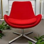 Load image into Gallery viewer, Red armchair with a metal base in a room with plants
