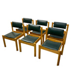 Load image into Gallery viewer, six wooden dining chairs with dark green upholstered seats and backrests, arranged in two rows on a plain white background.
