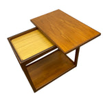 Load image into Gallery viewer, Wooden side table with a hinged top on a white background
