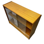 Load image into Gallery viewer, Wooden display cabinet with glass front on a white background
