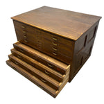 Load image into Gallery viewer, A vintage wooden drawer chest with a top surface and multiple drawers, including several pulled-out lower drawers, shown on a plain white background.
