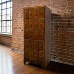 Load image into Gallery viewer, OAK FILING INDEX CARD CABINET AGAINST A BRICK WALL
