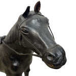 Load image into Gallery viewer, Black horse figurine with a bridle on a white background

