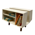 Load image into Gallery viewer, White bookshelf with books on a white background
