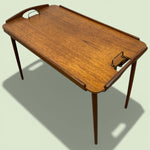 Load image into Gallery viewer, Wooden tray table with two handles on a light green background
