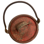 Load image into Gallery viewer, Vintage rusted metal lid with a handle on a white background
