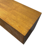 Load image into Gallery viewer, A close-up of a wooden furniture piece, showing the top surface with a warm golden-brown wood grain and the side panel in a darker brown tone, isolated on a white background.
