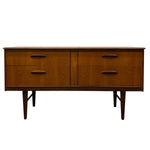 Load image into Gallery viewer, Mid-century modern wooden sideboard with four drawers, dark wood grain finish, and tapered legs, shown against a plain white background.
