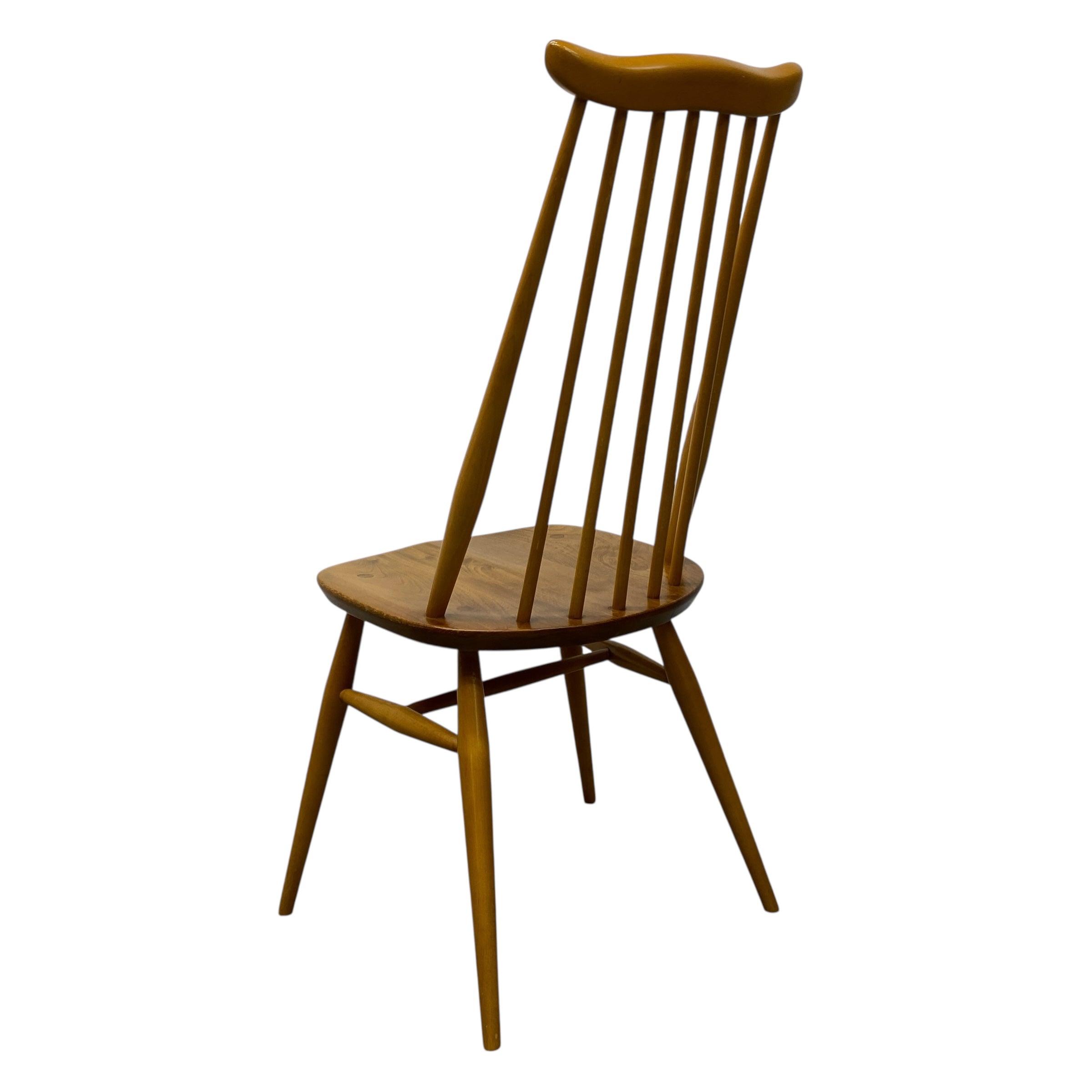 Wooden chair with spindle back design on a white background