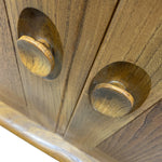 Load image into Gallery viewer, Close-up of wooden cabinet with two knobs on a white background

