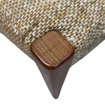 Load image into Gallery viewer, Close-up of a textured fabric surface with a wooden button and leg.

