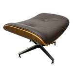 Load image into Gallery viewer, A mid-century modern lounge chair with a dark brown leather cushion, a curved wood veneer shell in a warm honey-brown tone, and a black metal swivel base with casters, shown on a plain white background.
