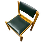 Load image into Gallery viewer, A mid-century modern wooden chair with dark green upholstered seat and backrest, shown from an elevated angle on a white background.
