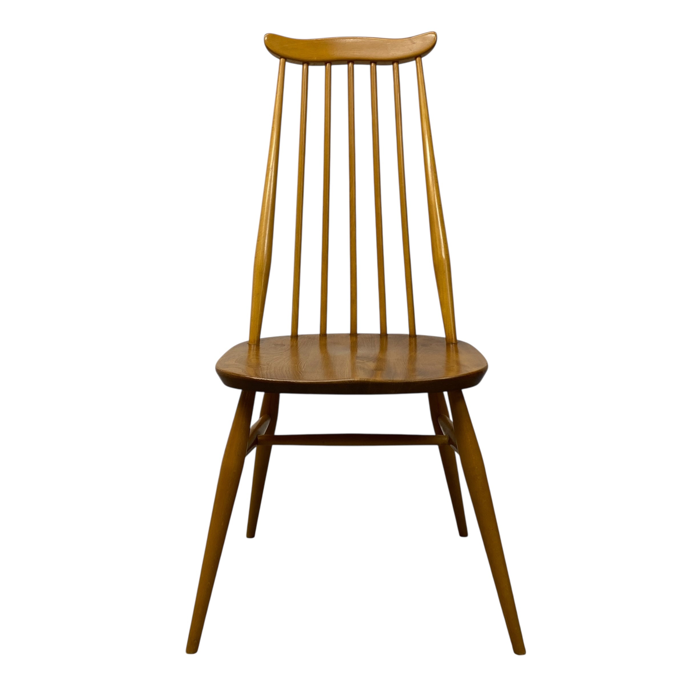 Wooden chair with spindle back design on a white background