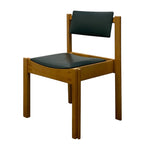 Load image into Gallery viewer, A modern wooden dining chair with a warm medium-brown wood frame and dark green padded seat and backrest, shown on a plain white background.

