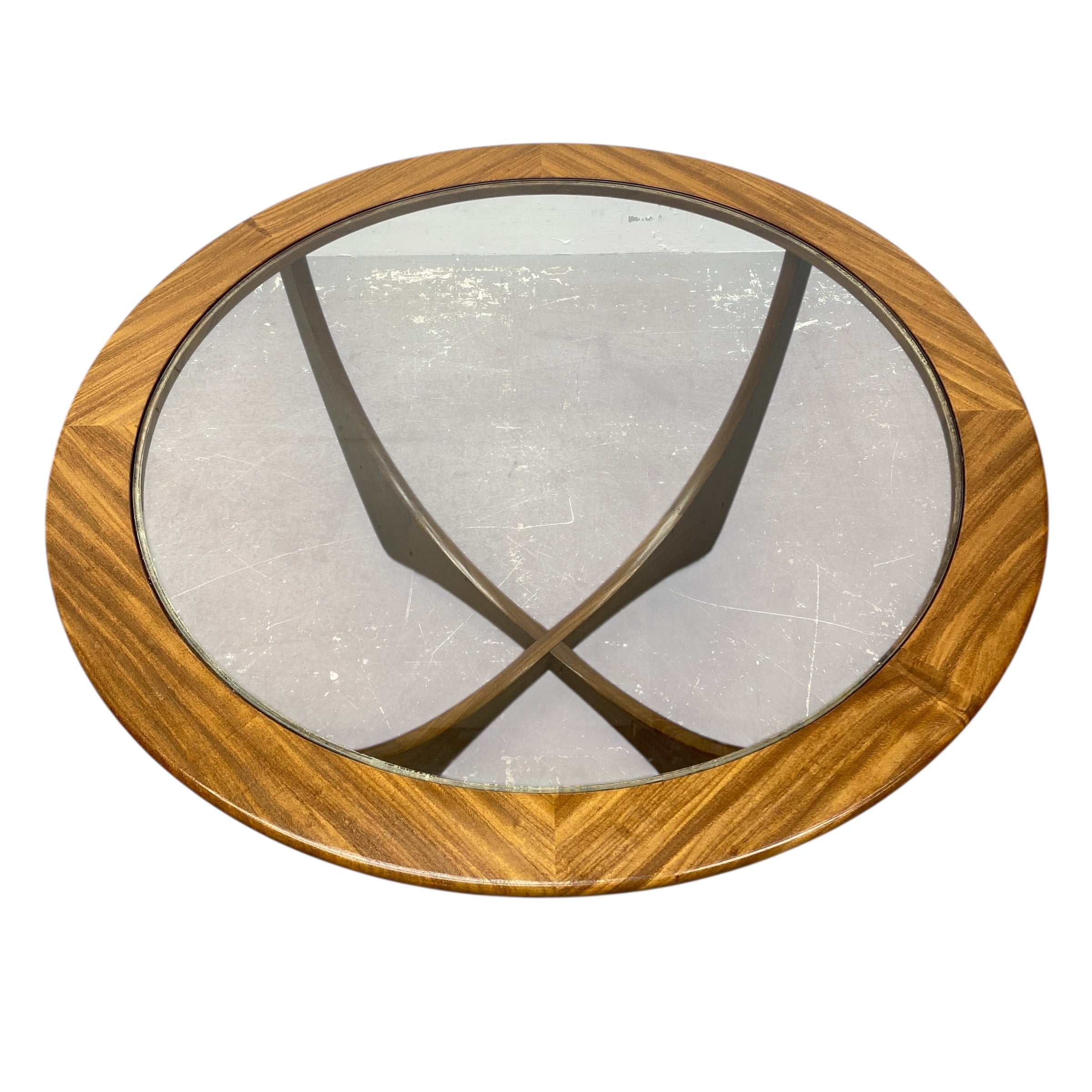 Round wooden-framed mirror with glass surface on a white background