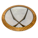 Load image into Gallery viewer, Round wooden-framed mirror with glass surface on a white background

