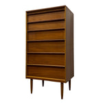 Load image into Gallery viewer, A mid-century modern wooden chest of drawers with five drawers, shown on a plain white background.
