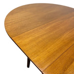 Load image into Gallery viewer, Wooden dining table with a white background
