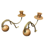 Load image into Gallery viewer, Decorative candle holder with spherical bases on a white background

