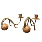Load image into Gallery viewer, Decorative candle holders with a gold and bronze design on a white background
