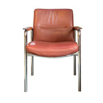 Load image into Gallery viewer, Brown leather chair with metal frame on a white background

