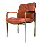 Load image into Gallery viewer, Brown leather chair with metal frame on a white background
