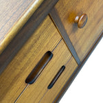 Load image into Gallery viewer, Close-up of a wooden drawer with handles on a white background
