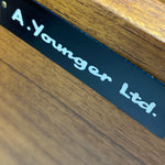 Load image into Gallery viewer, Wooden surface with a black label reading 'A. Younger Ltd.'
