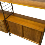 Load image into Gallery viewer, Wooden sideboard with drawers and a shelf on a white background

