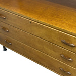 Load image into Gallery viewer, Wooden dresser with brass handles on a white background
