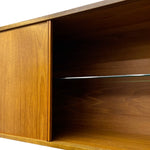Load image into Gallery viewer, Wooden cabinet with a glass shelf on a white background
