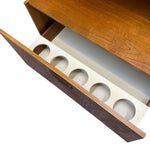 Load image into Gallery viewer, Teak wall unit with compartments on a white background for bottle storage
