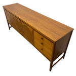 Load image into Gallery viewer, Wooden sideboard with circular designs on a white background
