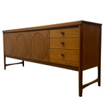 Load image into Gallery viewer, Wooden sideboard with circular designs and drawers on a white background
