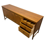Load image into Gallery viewer, Wooden sideboard with circular designs and drawers on a white background
