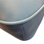 Load image into Gallery viewer, Close-up of a blue car seat cover corner on a white background
