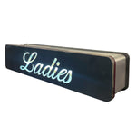 Load image into Gallery viewer, Neon sign with 'Ladies' text on a white background
