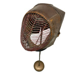 Load image into Gallery viewer, Vintage metal fan with a brown leather-like outer cover, wire grille, and round stand against a white background.
