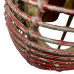 Load image into Gallery viewer, A close-up of a vintage red and white distressed metal wire basket or cage, showing the peeling paint and woven structure against a white background.
