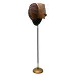 Load image into Gallery viewer, A vintage bronze-finished kendo shinai (staff and guard) set on a black pole with a round brass base, displayed against a solid white background.
