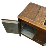 Load image into Gallery viewer, A vintage wooden cabinet with a weathered brown wood finish and a silver metal door panel on the left, shown against a plain white background.
