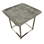 Load image into Gallery viewer, A square side table featuring a textured, metallic silver-gray top and a polished chrome metal frame base, shown against a plain white background.
