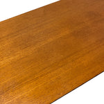 Load image into Gallery viewer, A close-up of a warm medium-brown wood grain surface, likely a tabletop or panel, shown against a white background.
