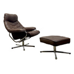 Load image into Gallery viewer, A mid-century modern lounge chair with an attached footrest and matching ottoman, both upholstered in dark brown leather with chrome metal bases, shown on a plain white background.
