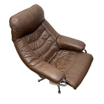 Load image into Gallery viewer, A mid-century modern brown leather recliner chair with quilted stitching and chrome metal legs, shown against a plain white background.
