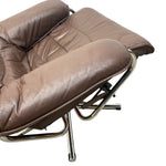 Load image into Gallery viewer, Brown leather recliner chair with a chrome metal frame, shown on a plain white background.
