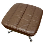Load image into Gallery viewer, A square brown leather footrest or ottoman cushion with stitched panel detailing and chrome metal legs, shown on a plain white background.
