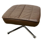 Load image into Gallery viewer, A brown leather ottoman with a quilted top and a chrome metal X-base, shown against a plain white background.
