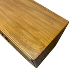 Load image into Gallery viewer, A close-up of a wooden furniture piece, showing the top surface with a warm golden-brown wood grain finish and a dark brown side edge, isolated on a white background.
